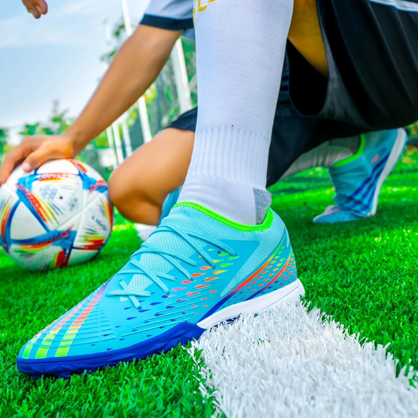 Mavi ve siyah Erkek futbol kramponları
